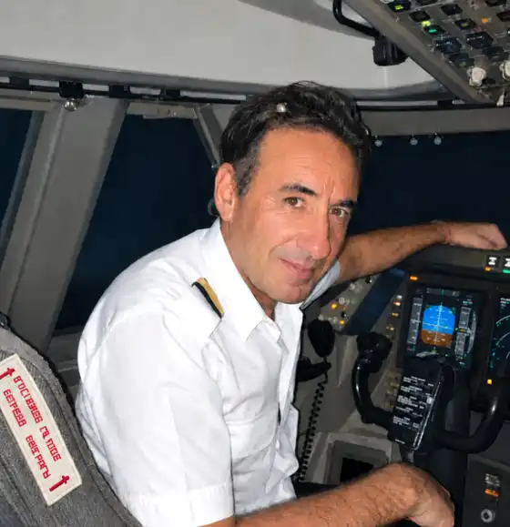 Portrait of Fabrice René Boutet, Business Development Manager at LNK Aviation, on a flight deck.